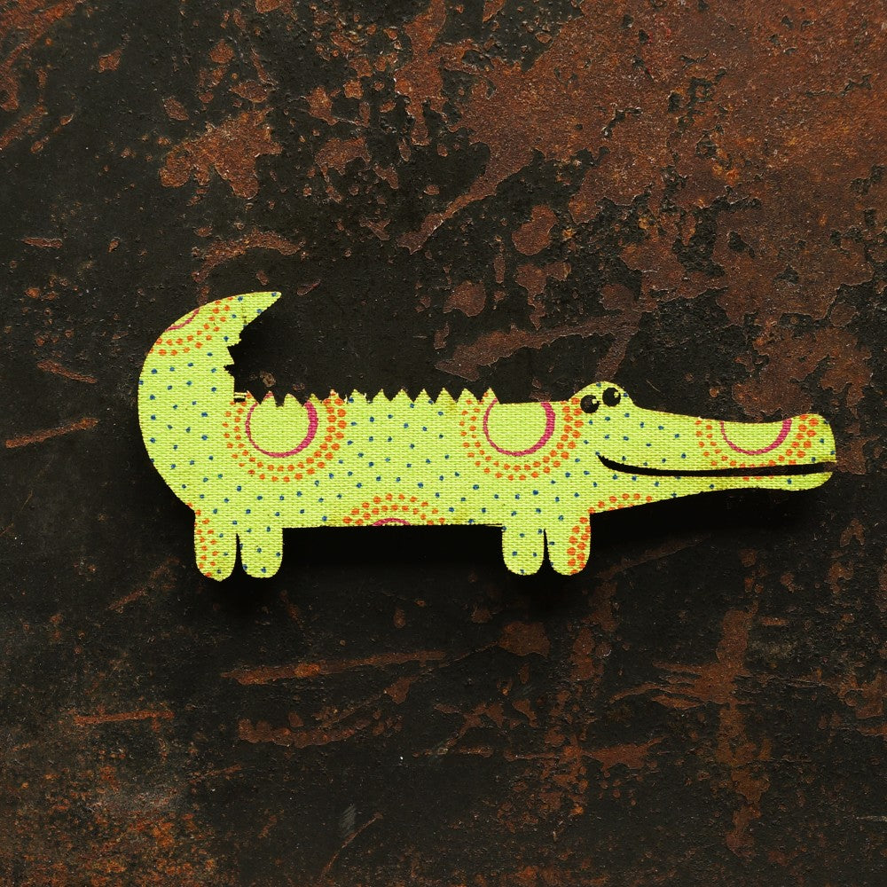 Crocodile magnet covered with vibrant South African Shweshwe fabric.