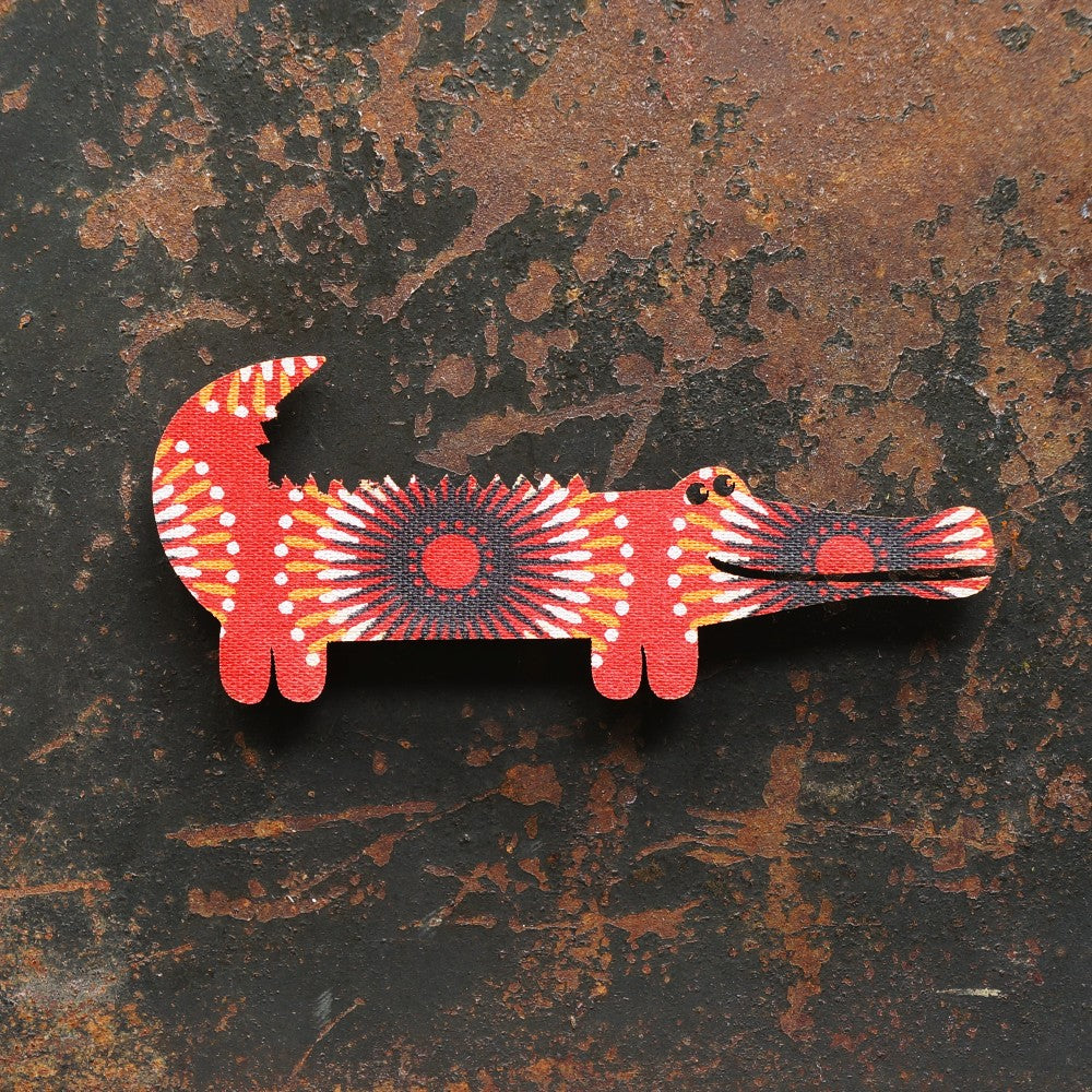Crocodile magnet covered with vibrant South African Shweshwe fabric.
