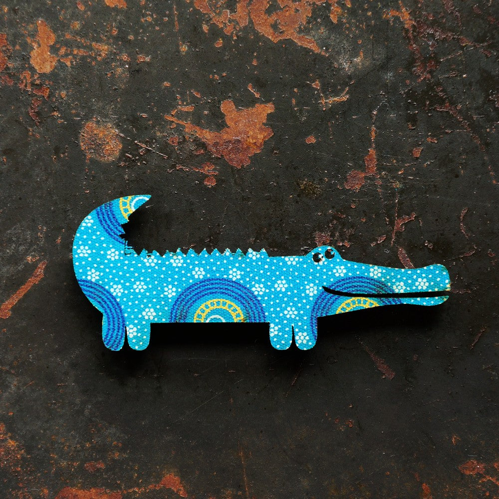 Crocodile magnet covered with vibrant South African Shweshwe fabric.