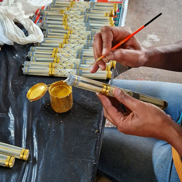 A small paintbrush is used for finer foreground details.