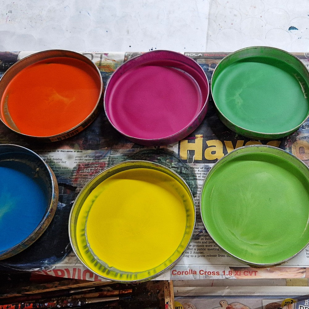 Fine colour pigments and hot wax are used for decorating.